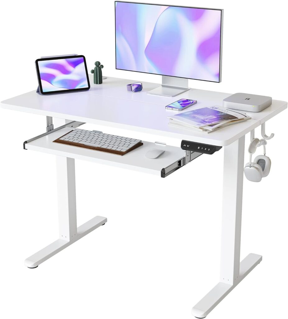 FEZIBO Height Adjustable Electric Standing Desk with Keyboard Tray, 100 x 60 cm Sit Stand up Desk with Splice Board, White Frame/White Top